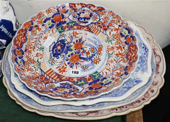 An Imari dish and three meat plates